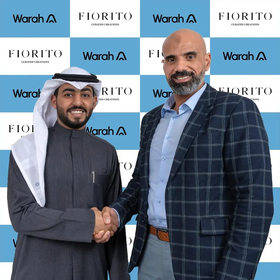 Fiorito and Warah representatives shaking hands